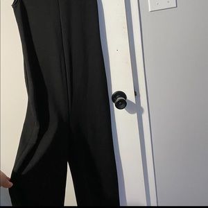 One piece jumpsuit with high neck, loose bottoms size 4